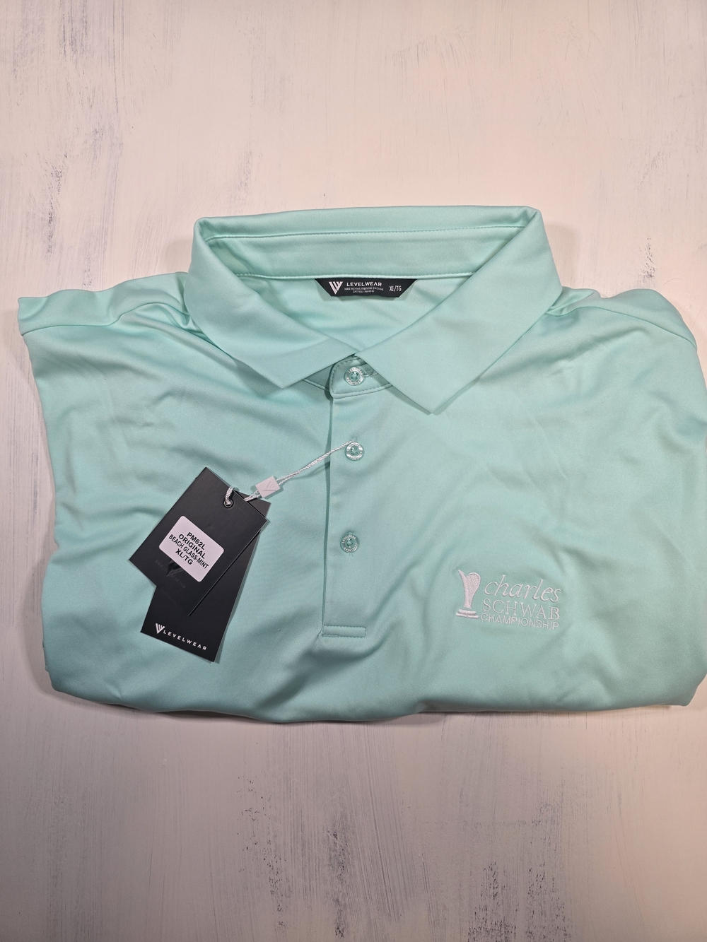 Charles Schwab Mint Green Performance Polo